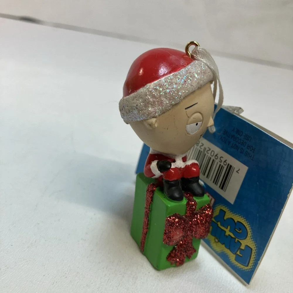2011 Family Guy's Stewie Sitting On Green Present Christmas Ornament NOS